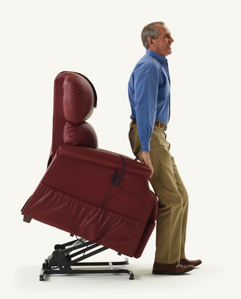 Man using lift chair to stand up